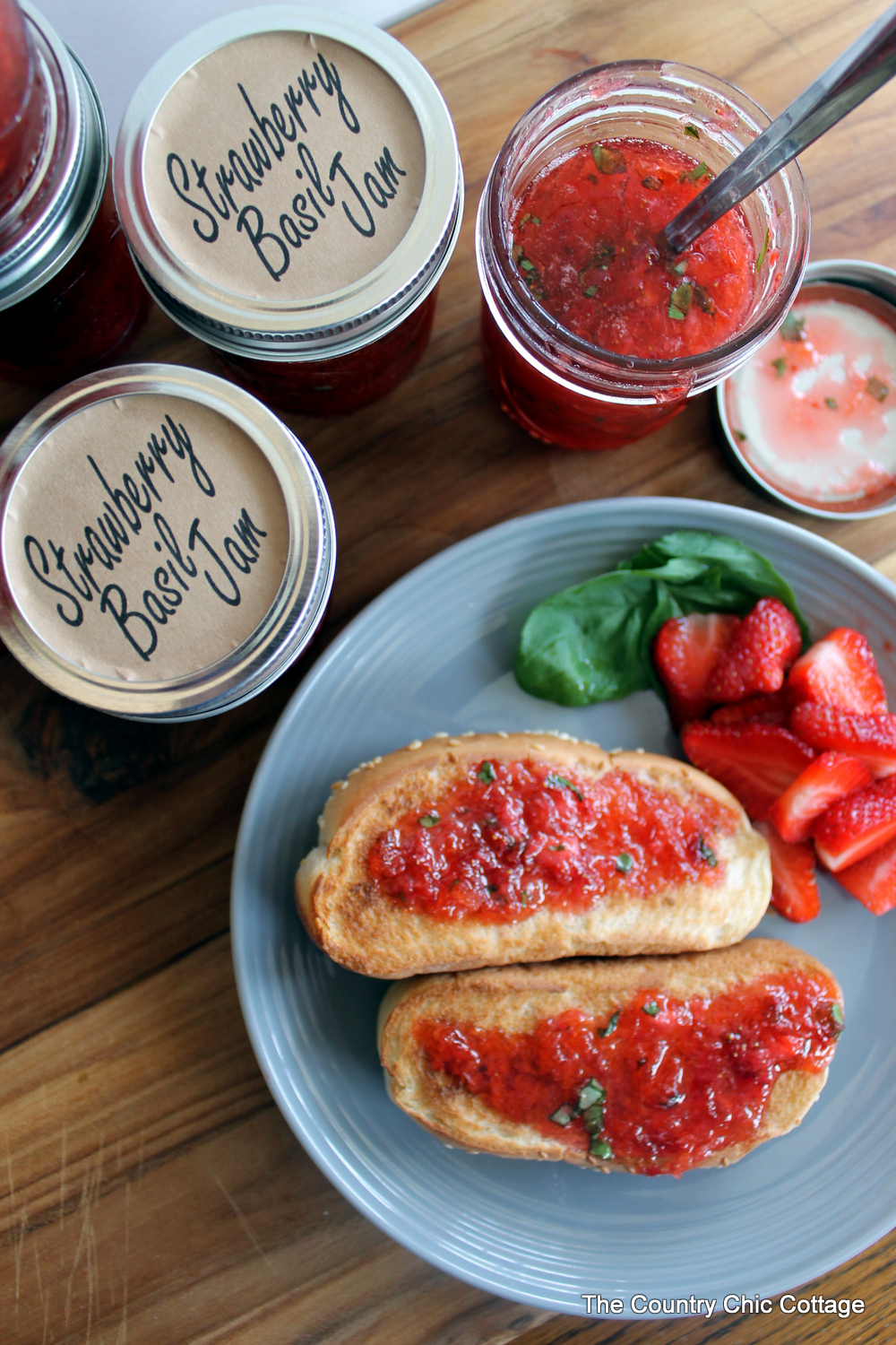 Make strawberry basil jam and add on our free printable labels! A great freezer jam recipe that only takes minutes to make! The sweet and savory combination will really hit the spot!