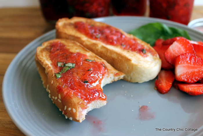 Make strawberry basil jam and add on our free printable labels! A great freezer jam recipe that only takes minutes to make! The sweet and savory combination will really hit the spot!