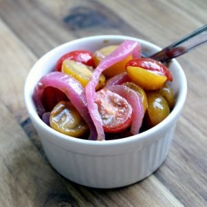 Make this tomato salad recipe with pickled red onions! A great summer salad that everyone will love!