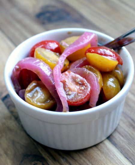 Make this tomato salad recipe with pickled red onions! A great summer salad that everyone will love!