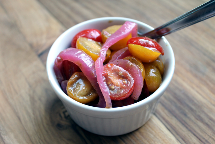 Make this tomato salad recipe with pickled red onions! A great summer salad that everyone will love!