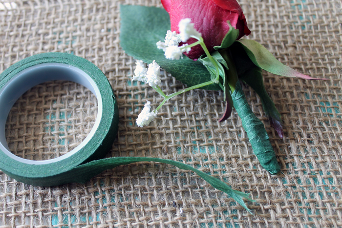 artificial rose wrapped in floral tape