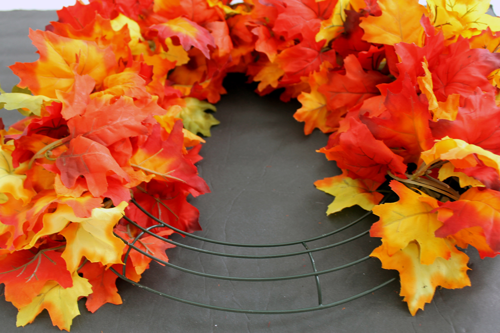 add fall leaves to a wreath