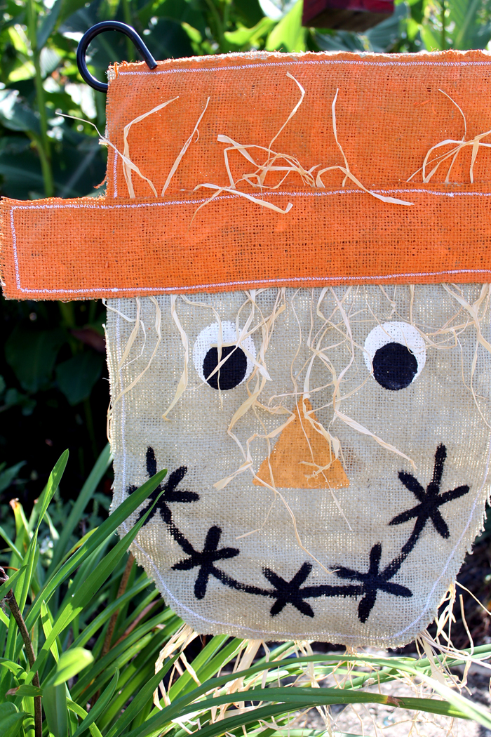 closeup burlap scarecrow garden flag