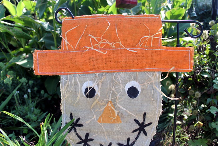 closeup burlap scarecrow garden flag