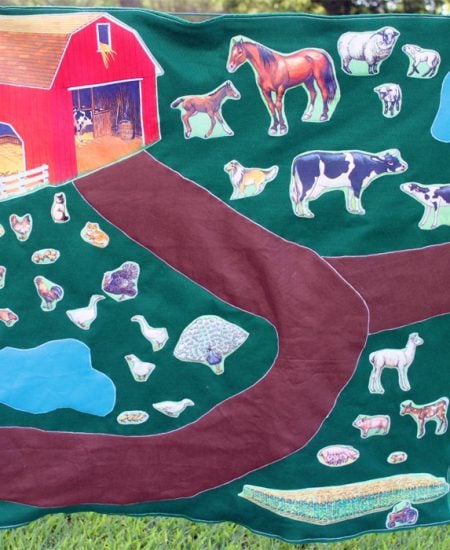 Make this DIY farm play mat for any child! A sewing project that makes a great gift idea for kids!