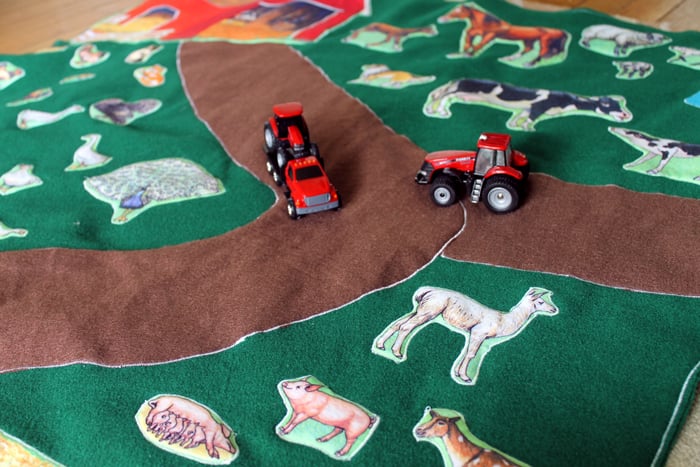 toy tractors on homemade mat