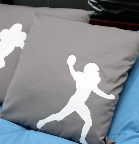 Make these DIY football silhouette pillows with a few simple supplies! A quick and easy project that is perfect for a boy's room!