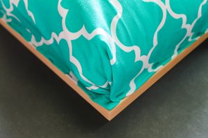 stapling folded fabric corners