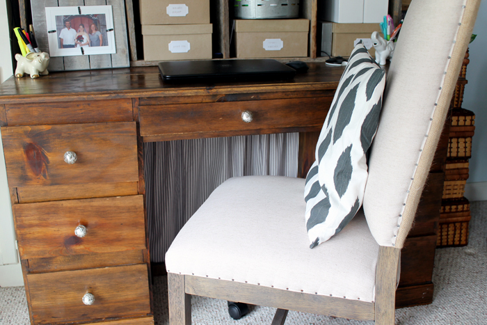 This farmhouse style office space has plenty of storage to help keep your workspace organized.