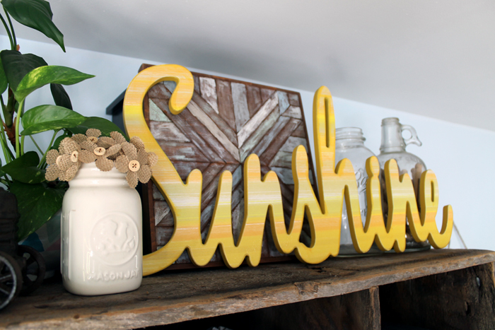 I love the pop of color this sunshine sign adds to my farmhouse style office.