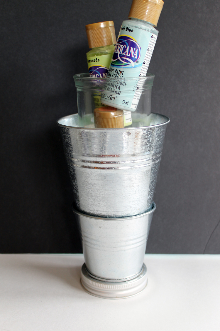 acrylic paints and metal pails