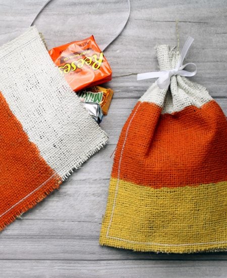 Make these candy corn Halloween treat bags from burlap in just minutes! Great step by step instructions!