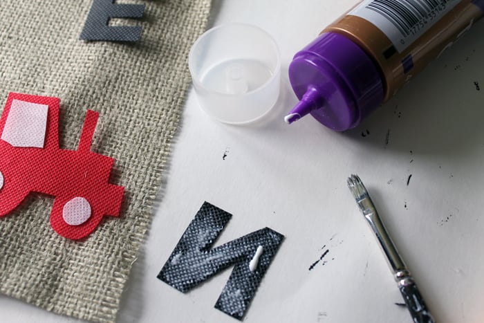 How to glue letters onto your tractor themed first birthday banner