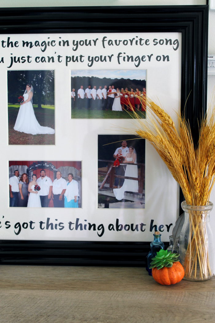 Song Lyric Wedding Frame completed with vase of wheat straws and pumpkin