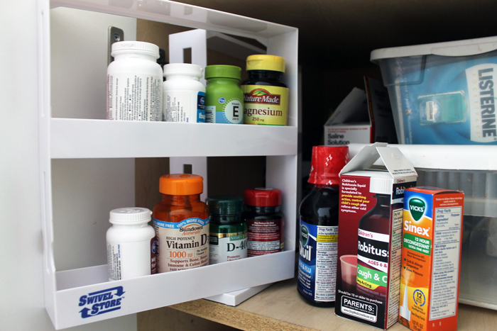 using a spice rack to organize medicine