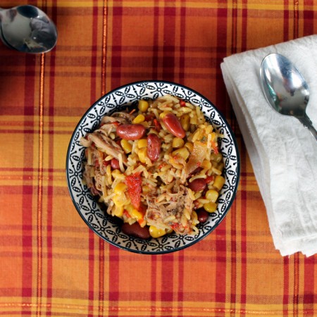 This jerk pork rice bowl is the perfect crock pot meal for winter! Get out that slow cooker!