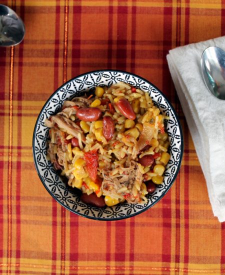 This jerk pork rice bowl is the perfect crock pot meal for winter! Get out that slow cooker!