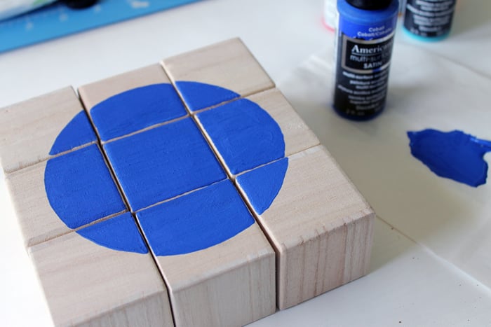 wooden blocks with blue circle in center