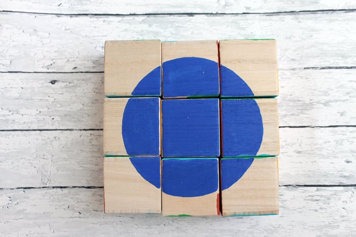 wooden blocks with blue circle
