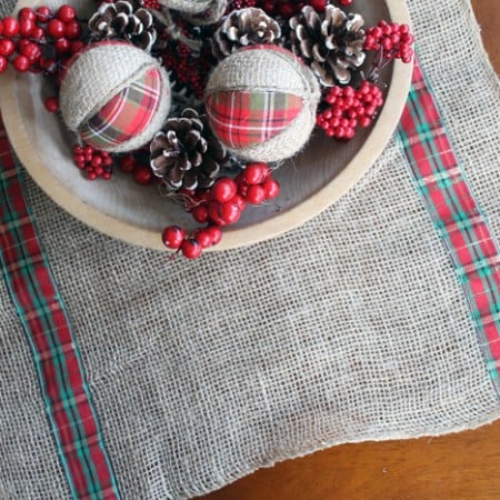 This burlap and plaid table runner is perfect for Christmas! See how to make your own version!