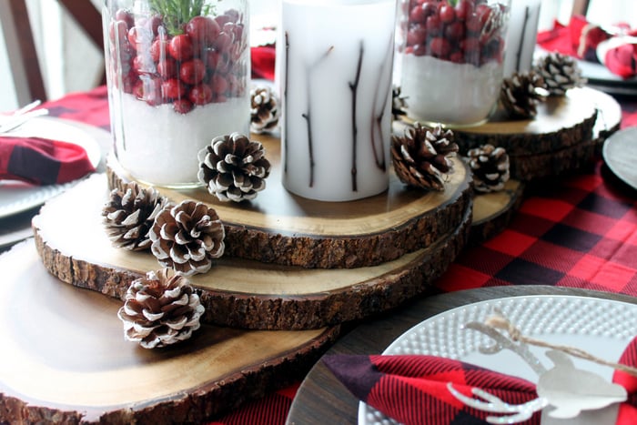 rustic centerpiece with pinecones, mason jars and twig candles