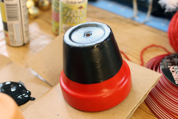 black and red painted terra cotta pots