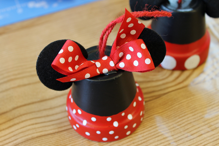 assembling minnie and mickey mouse ornament