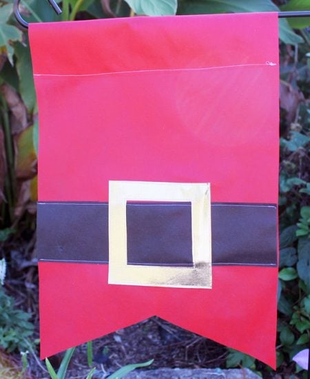 Make a Santa garden flag for your outdoor Christmas decor!