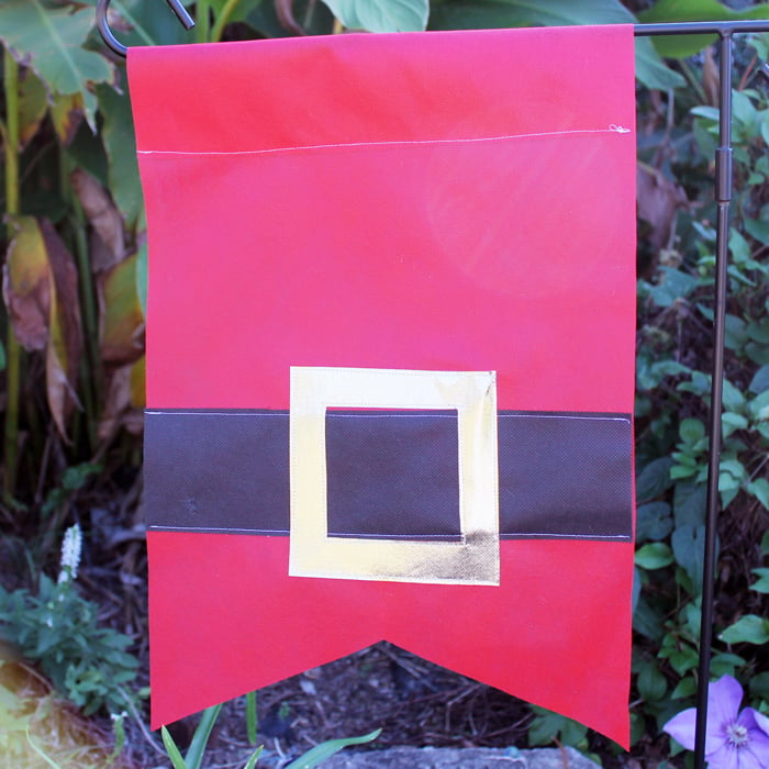 Make a Santa garden flag for your outdoor Christmas decor!