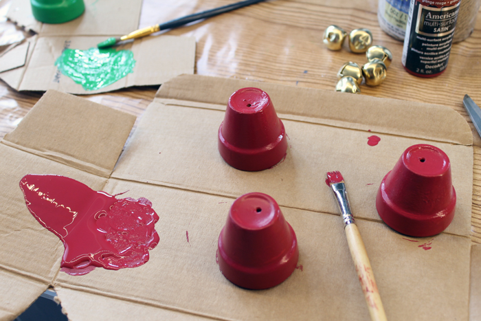 painting clay pots red