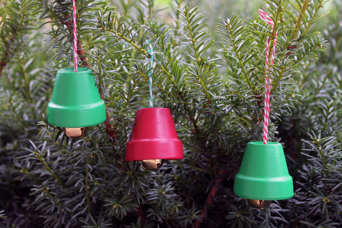 Christmas bell ornaments hanging on tree