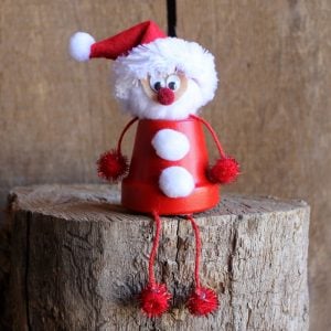 Make this terra cotta Santa for your home! Pots become Christmas decor!