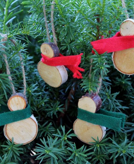 These wood slice snowmen ornaments are easy to make and perfect for your rustic farmhouse Christmas tree!