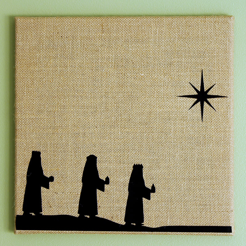 vinyl cutout on canvas of wisemen walking toward north star