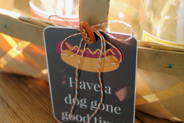 A tag on a basket that reads "Have a dog gone good time"