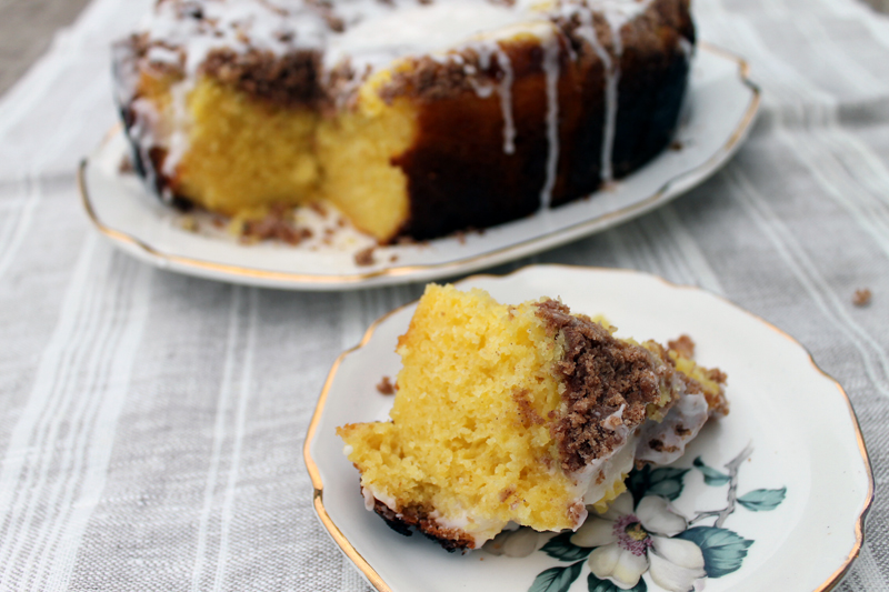 a sliced of cinnamon coffee cake on a plate