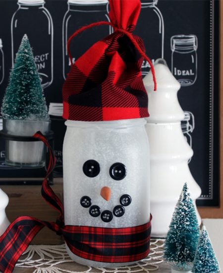 Make this snowman jar luminary for your home or as a gift idea!