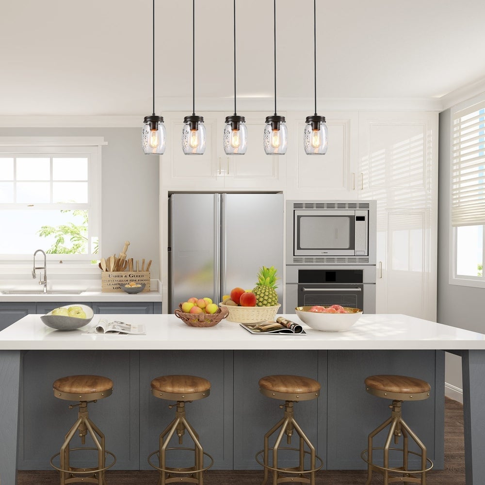 mason jar fixture over a kitchen island