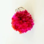 Learn how to make a pom pom key chain with a pom pom maker!