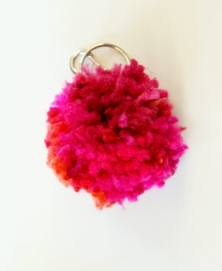 Learn how to make a pom pom key chain with a pom pom maker!