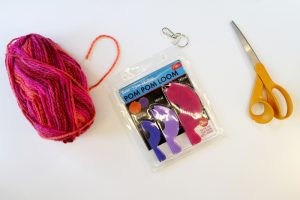 Learn how to make a pom pom key chain with a pom pom maker!