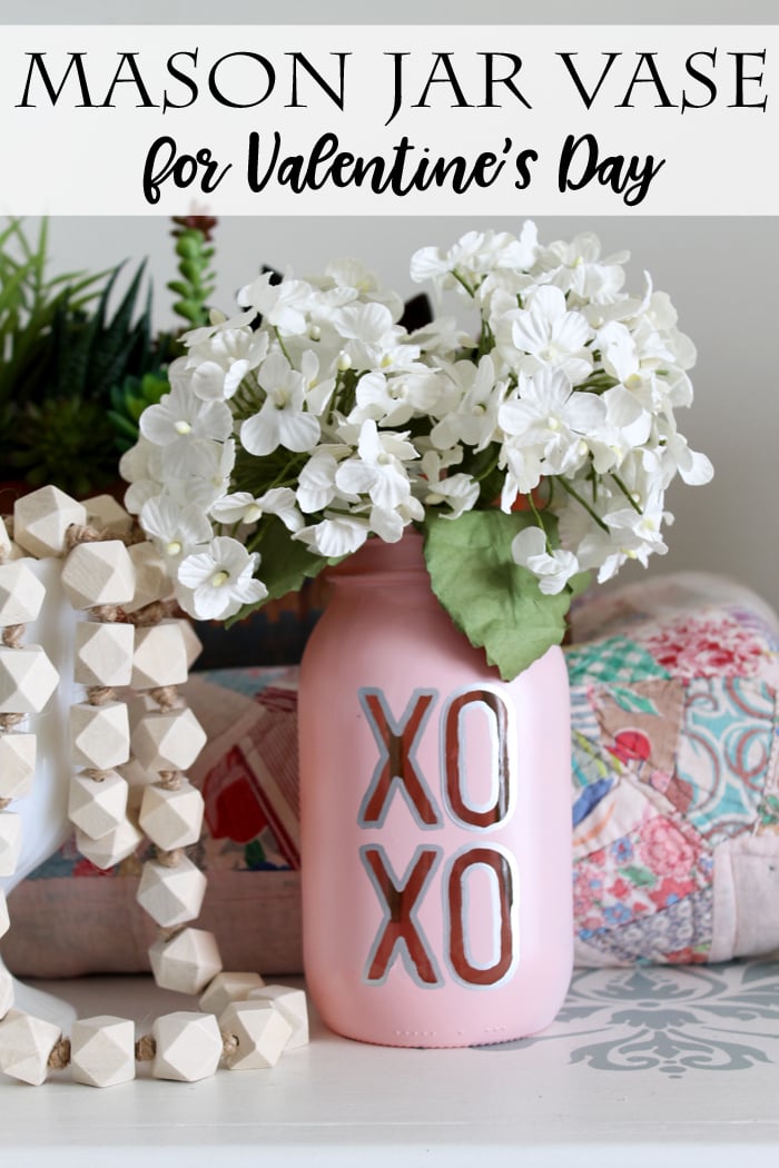 pinnable image with text overlay saying mason jar vase for valentine's day