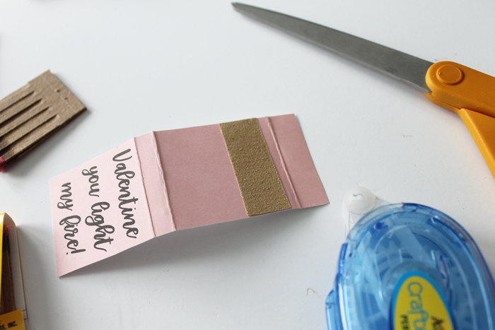 gluing sandpaper to the back of a matchbook