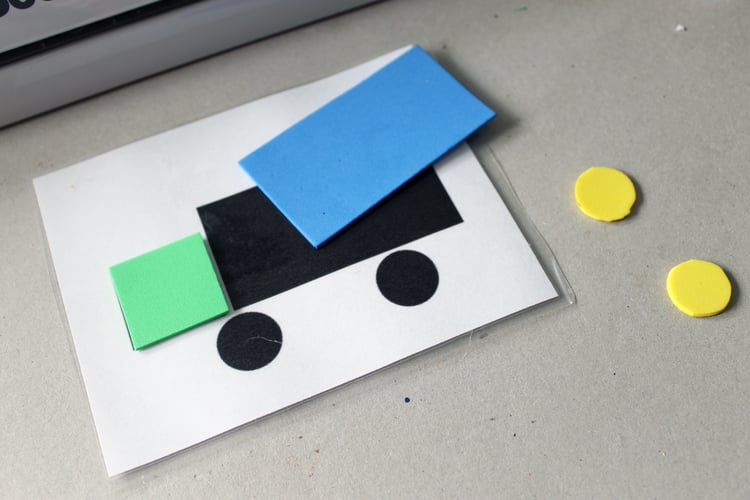 showing cut foam shapes on top of laminated shape cards