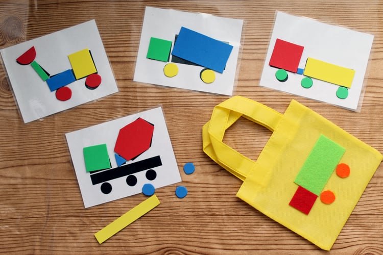 completed bag, shape cards, and cut shapes