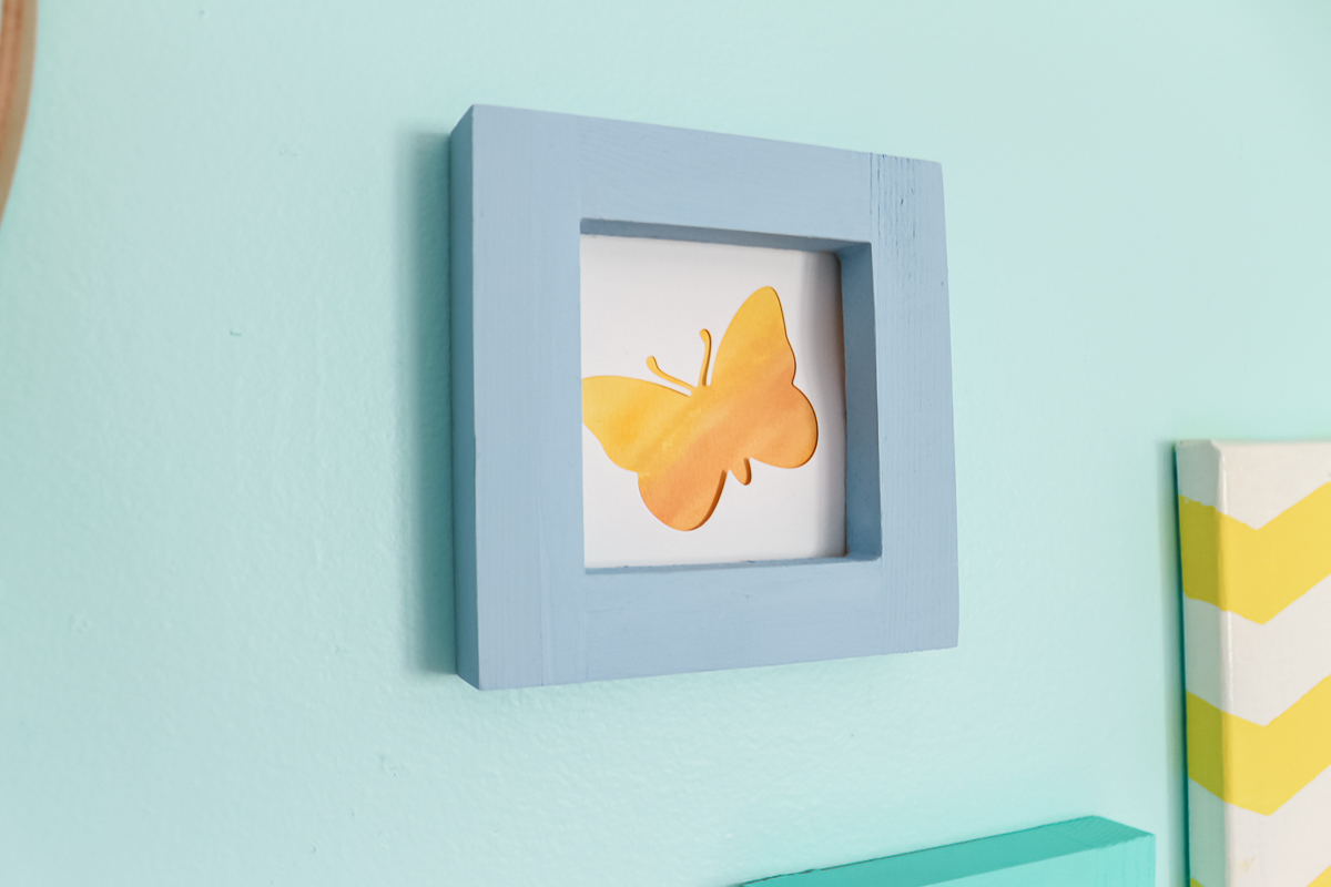 butterfly watercolor art on a wall