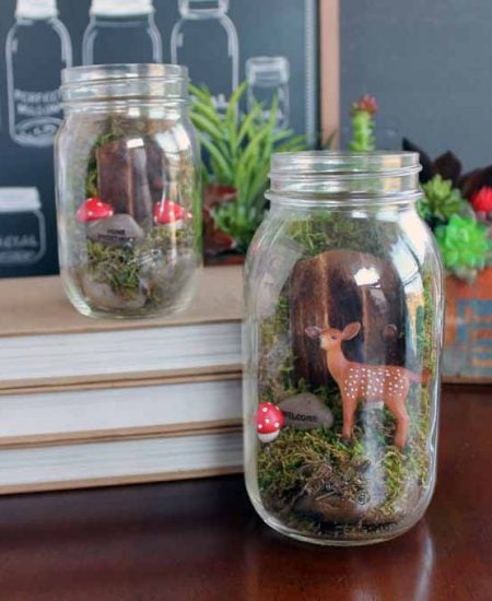 Make this fairy garden terrarium from a mason jar! A quick and easy craft project that makes a great gift idea!