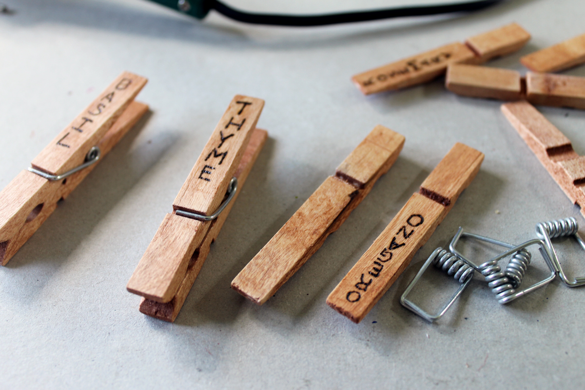 Herb garden design - make a rustic herb garden with an old wheel! Plus instructions on making clothespin herb markers!