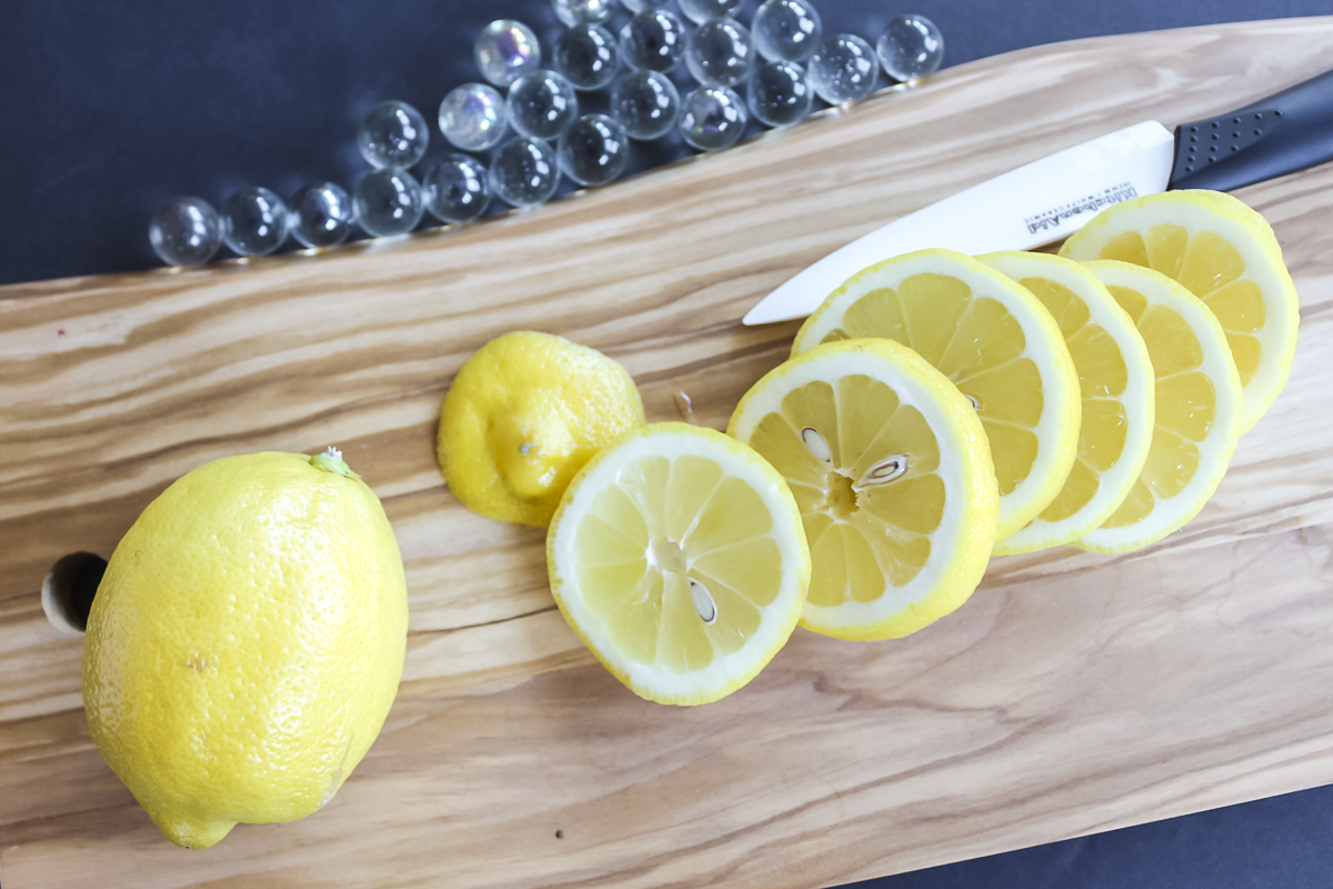 cutting lemons into slices